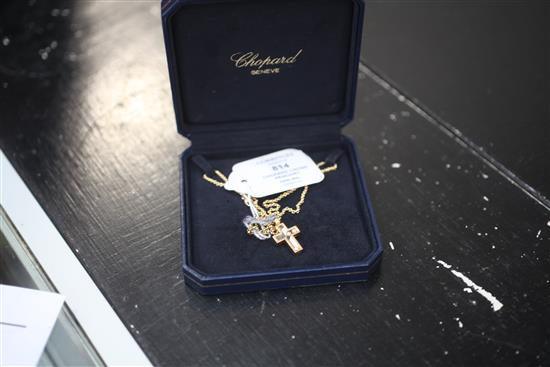 A Chopard Happy Diamond glass-panelled cross pendant,